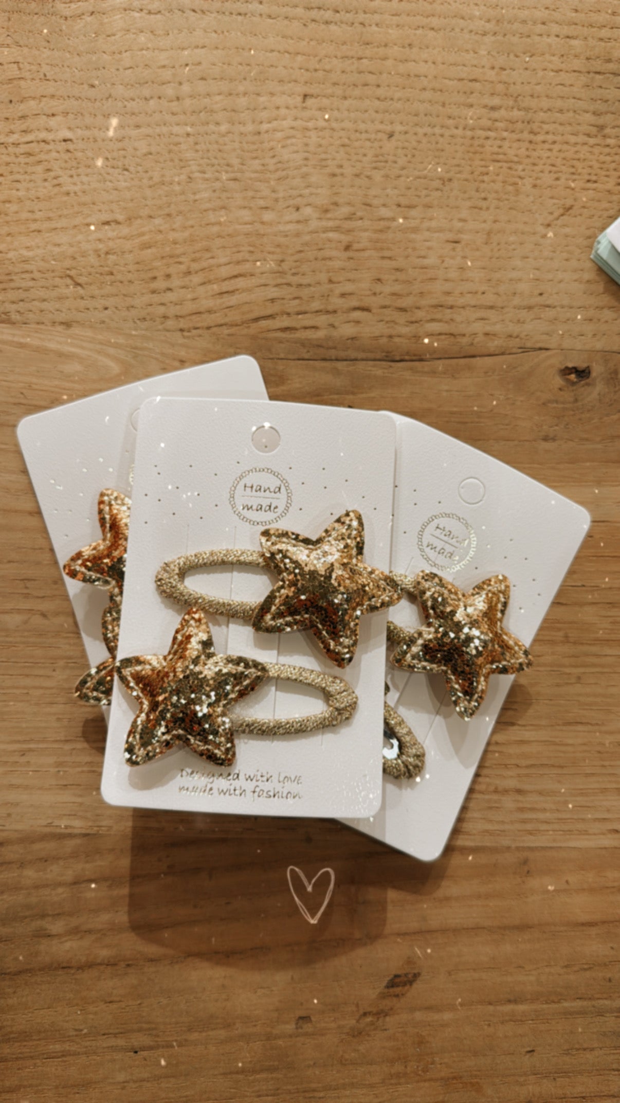 Barrettes étoiles à paillettes doré