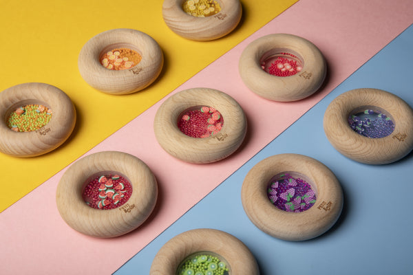 Hochet sensoriel Sensory Donut aubergines