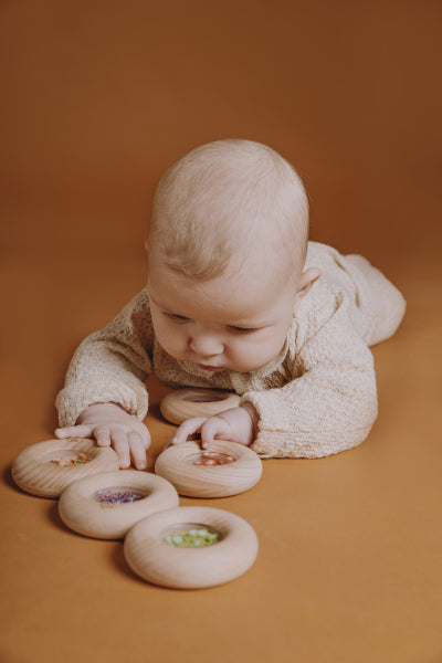 Hochet sensoriel Sensory Donut aubergines
