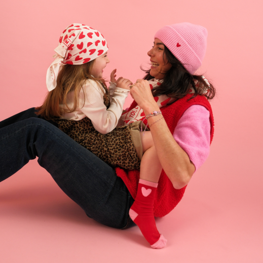 Bonnet rose en laine avec 🖤