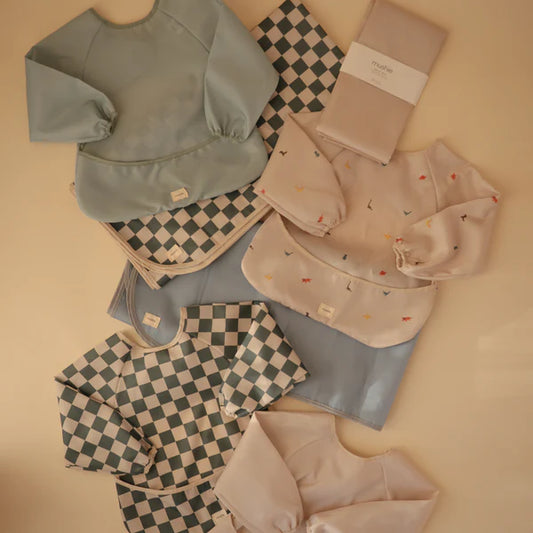 bavoir tablier à damier vert