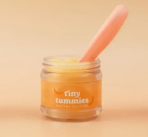 Petit pot avec cuillère pour les poupées