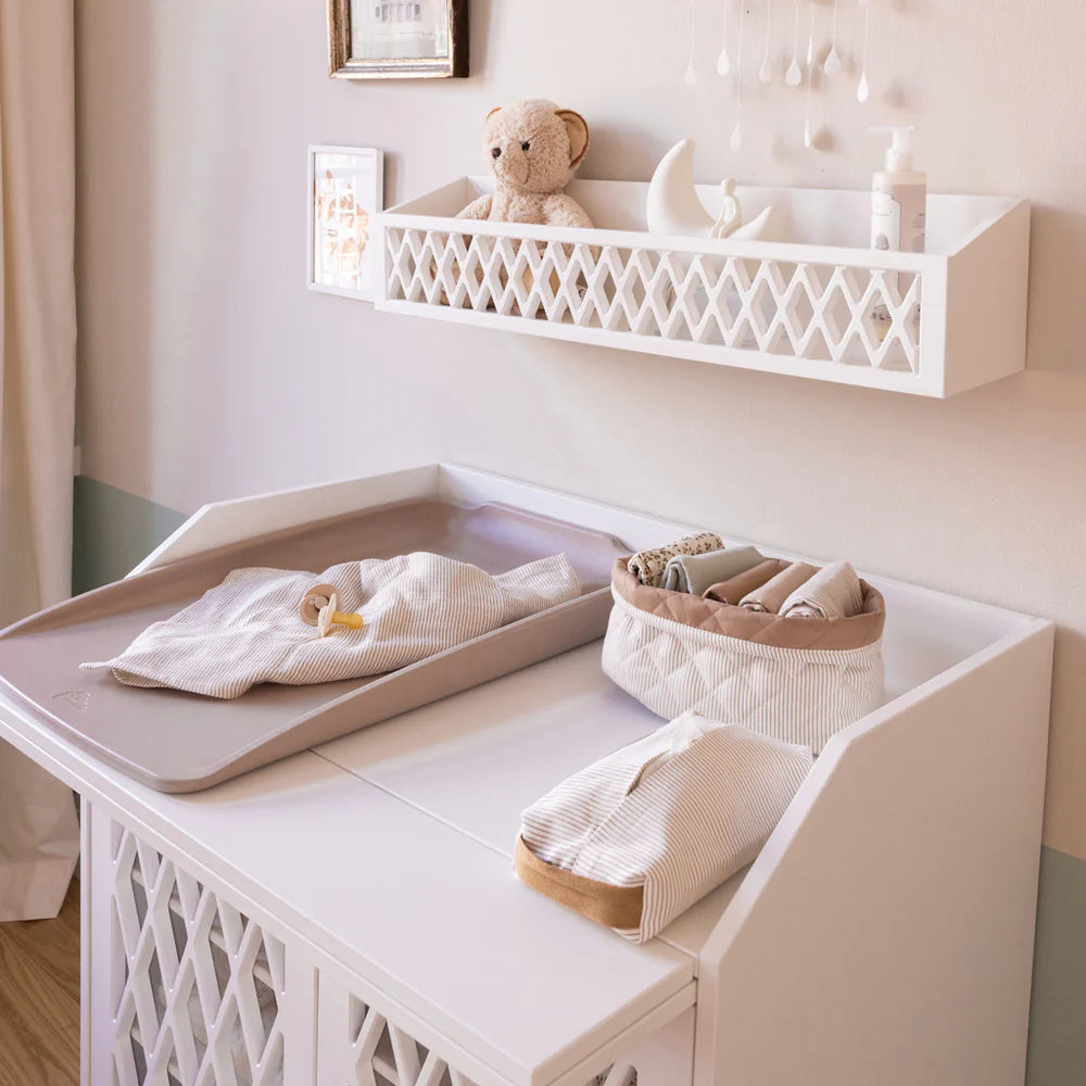 Matelas à langer avec un plan dur