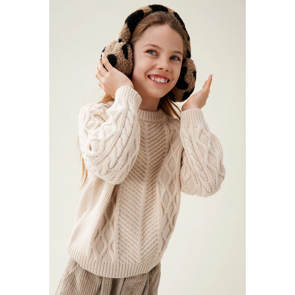 Cache-oreilles en polaire léopard