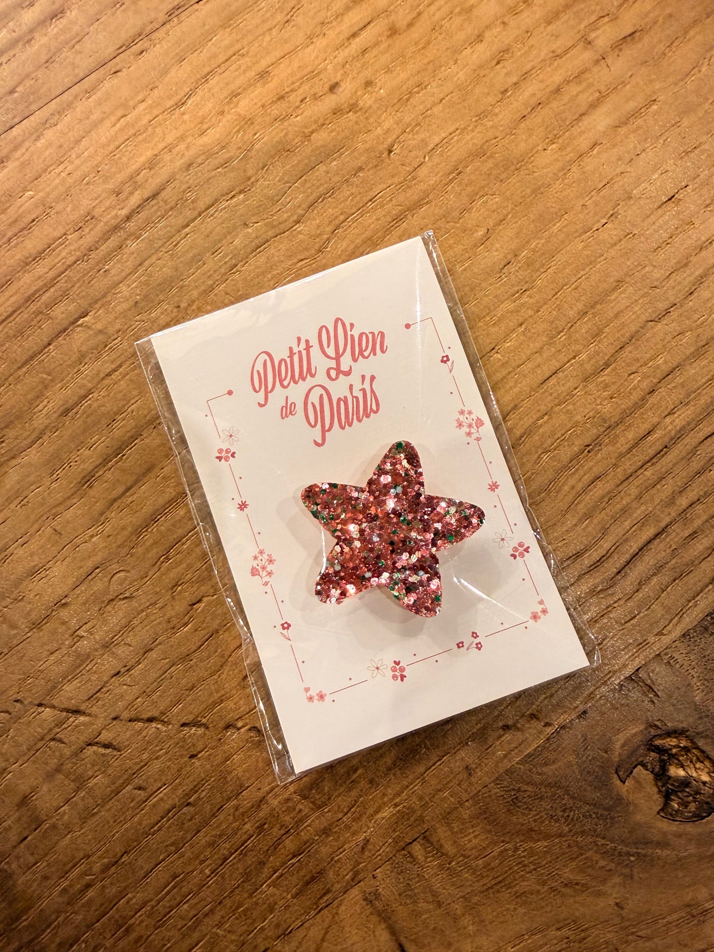 Broche étoile à paillettes rose