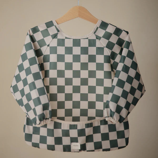 bavoir tablier à damier vert