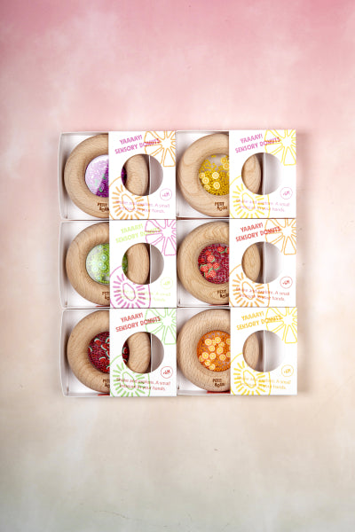 Hochet sensoriel Sensory Donut fraises