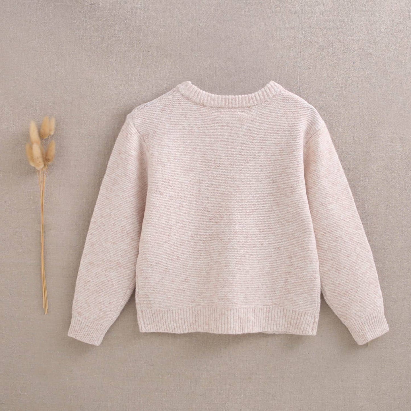 Veste en maille beige avec boutons en bois
