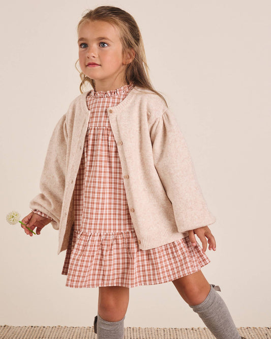 Veste en maille beige avec boutons en bois