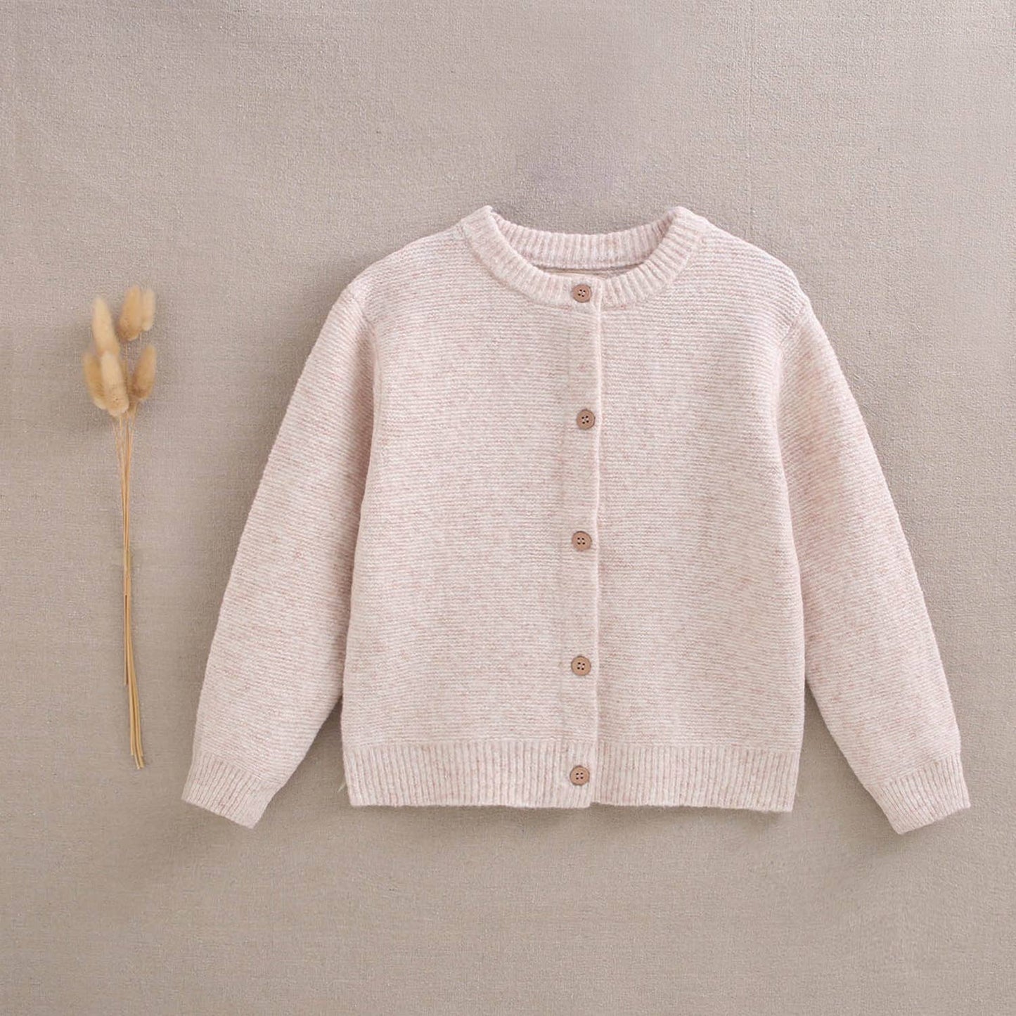 Veste en maille beige avec boutons en bois