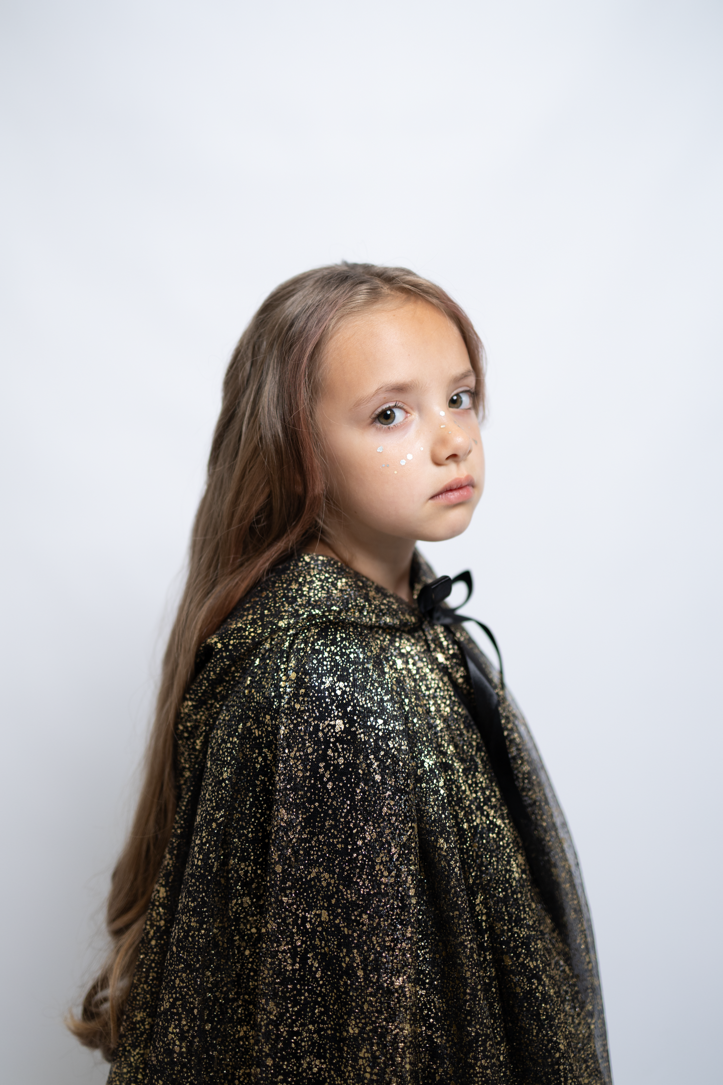 Cape magique de fête noir et doré