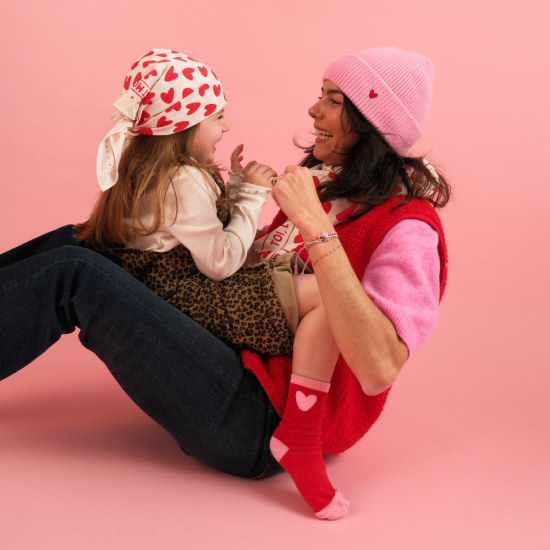 Bonnet rose en laine avec 🖤