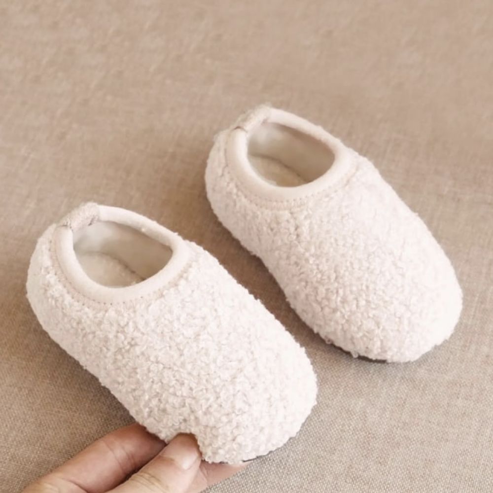 Chaussons en moumoute Beige