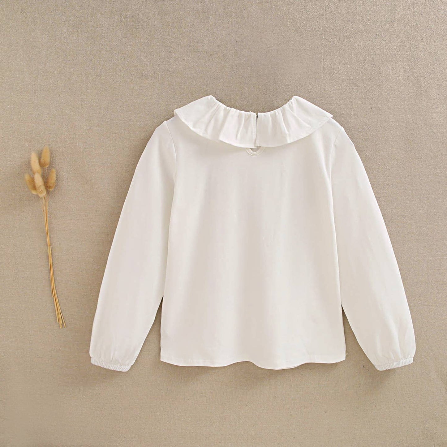 T-shirt blanc en coton à col volanté pour fille
