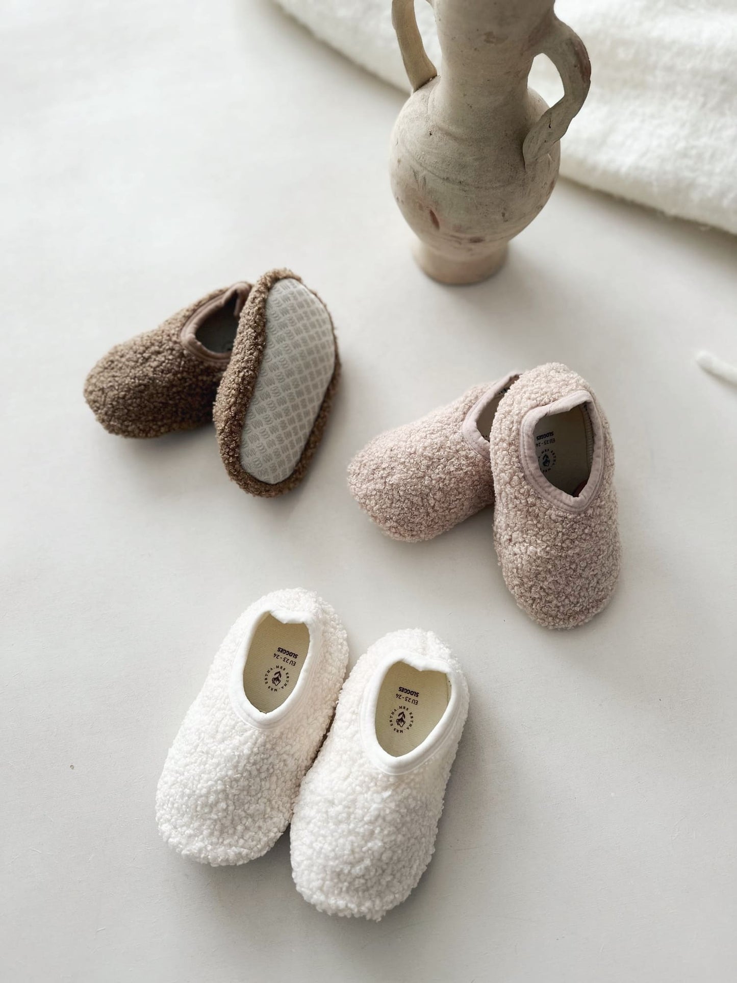 Chaussons en moumoute Beige