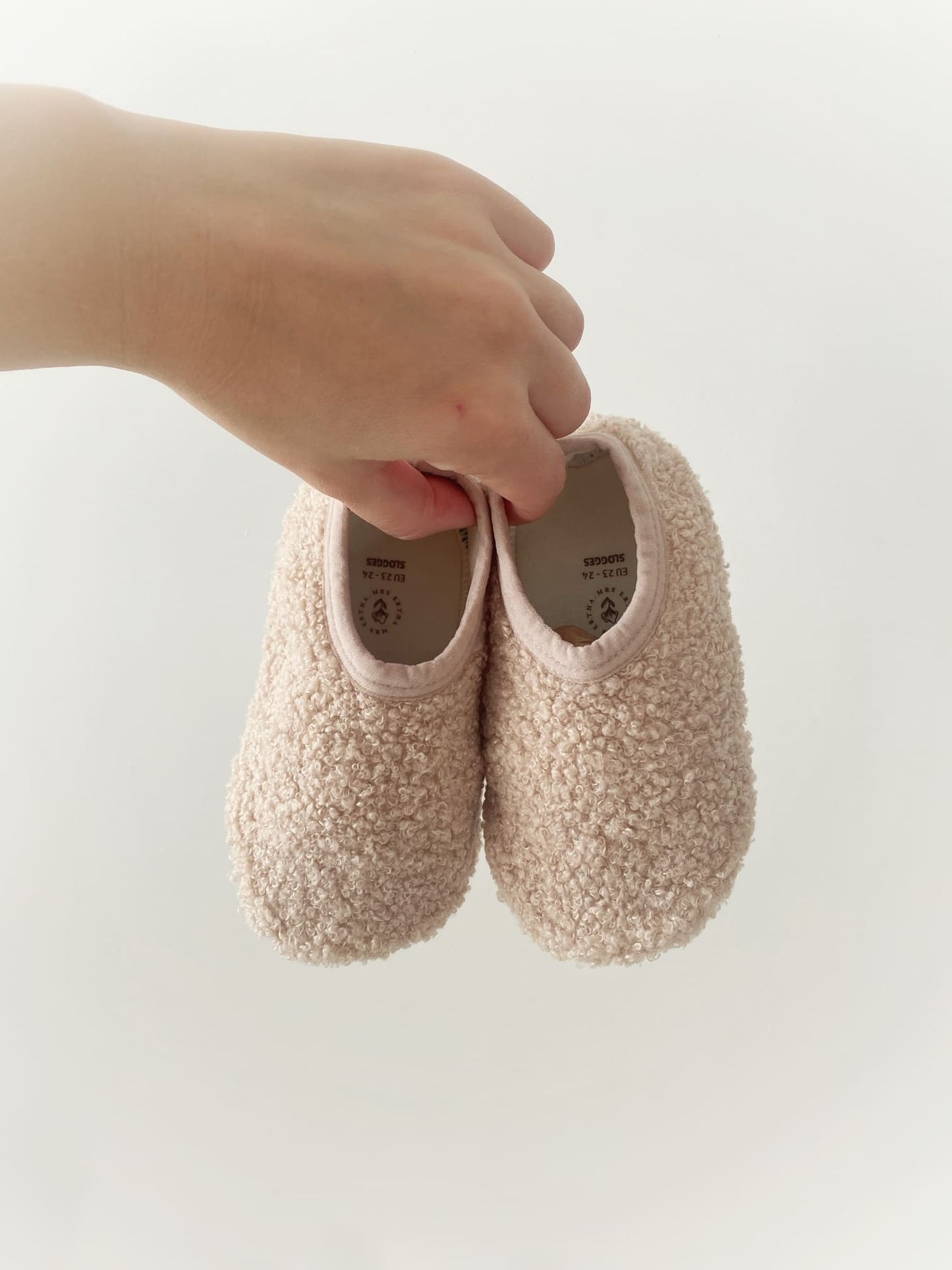 Chaussons en moumoute Beige