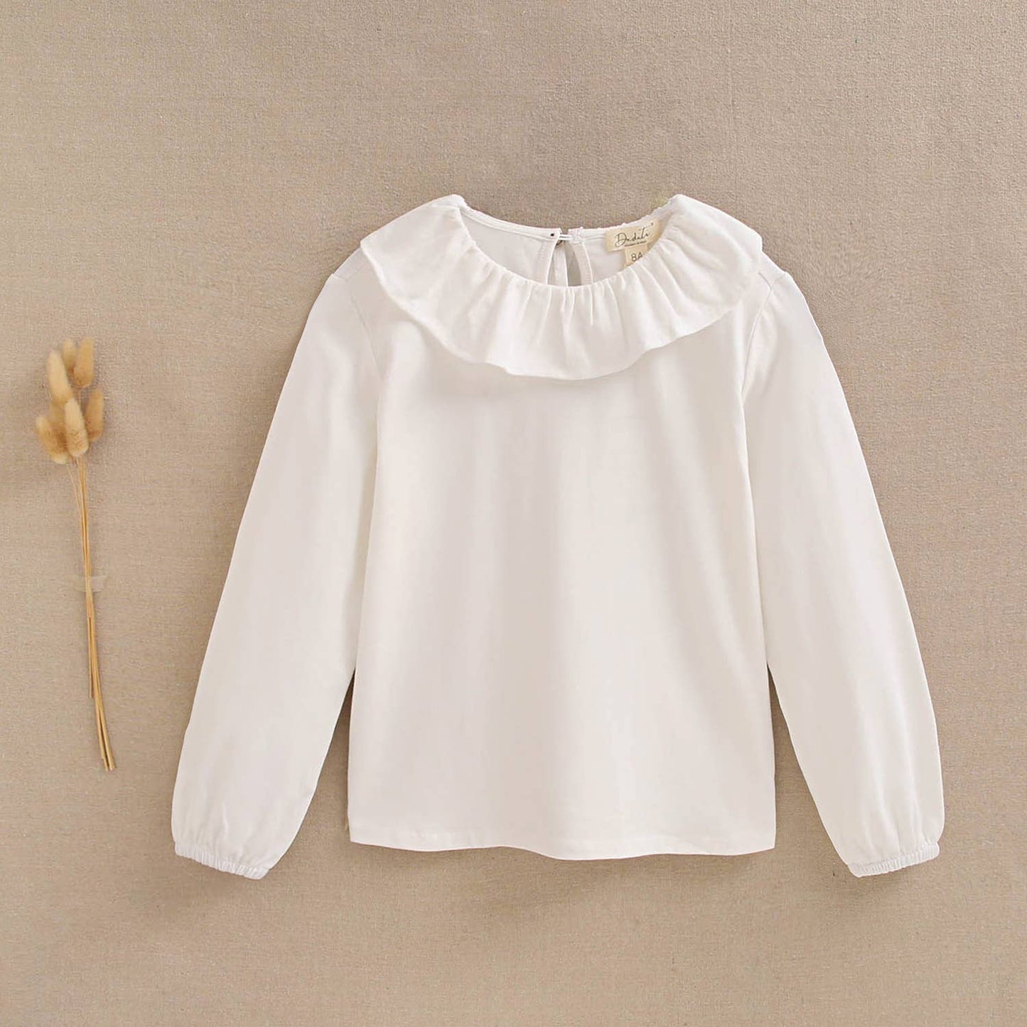 T-shirt blanc en coton à col volanté pour fille