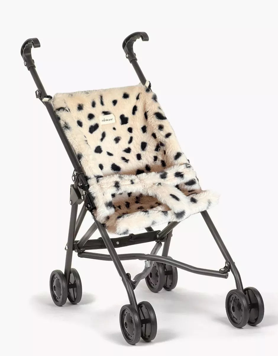 Poussette poupée en fausse fourrure dalmatien sur châssis noir